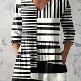 Mariana | Blusa Larga com Decote em V
